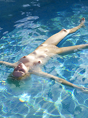 Young girl Maya relaxing in the water