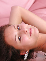With her seductively hypnotic gaze, tempting poses showcasing her gorgeous physique all over the pink sofa, Yarina is a delightfully perfect babe.