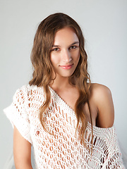 Smooth fair skin, puffy brown nipples, slim and slender body, and an alluring charming face makes Patsy the perfect centerpiece inside this all white studio.