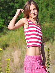 Lovely slender babe likes to pose naked on the sun in wild environment. Wilderness out as well inside is her best asset.